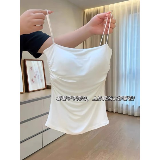 A stunningly beautiful white, pure and alluring camisole with padded bra; perfect for layering with a shirt or wearing on its own. Features a beautiful backless design.